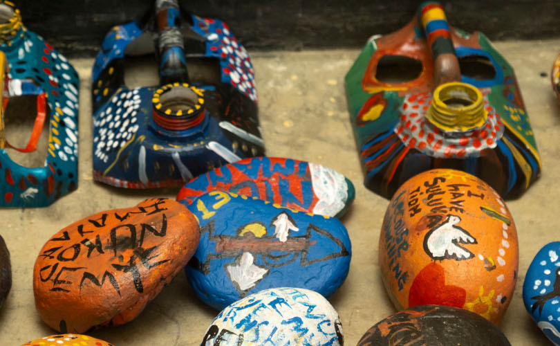 Painted stones and masks