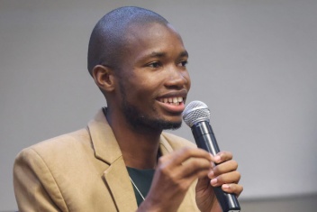 Ibrahim Kasujja speaking at the McGill Africa Umoja Summit