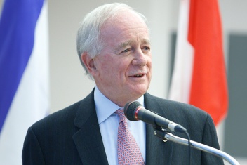 A man speaking into a microphone