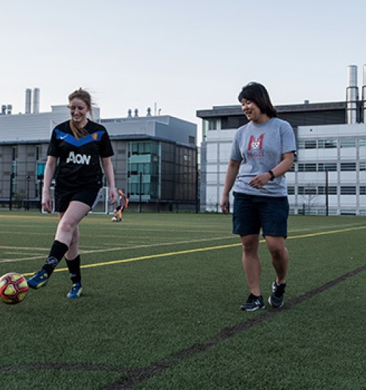 Students playing soccer