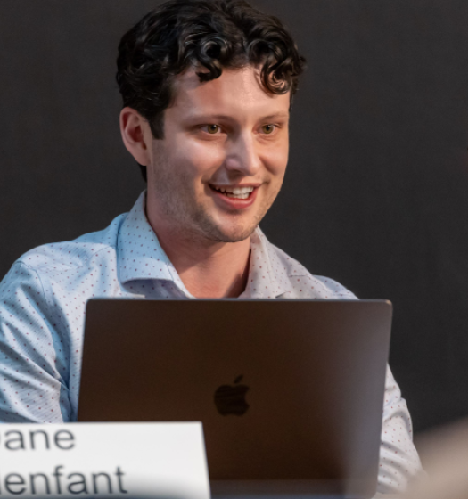 Dane Malenfant speaking at a conference