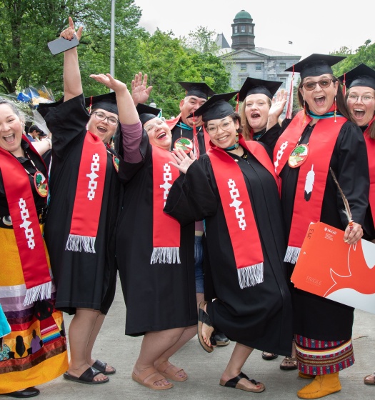 McGill graduates with scarves.