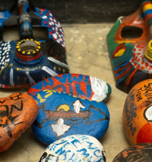 Painted stones and masks