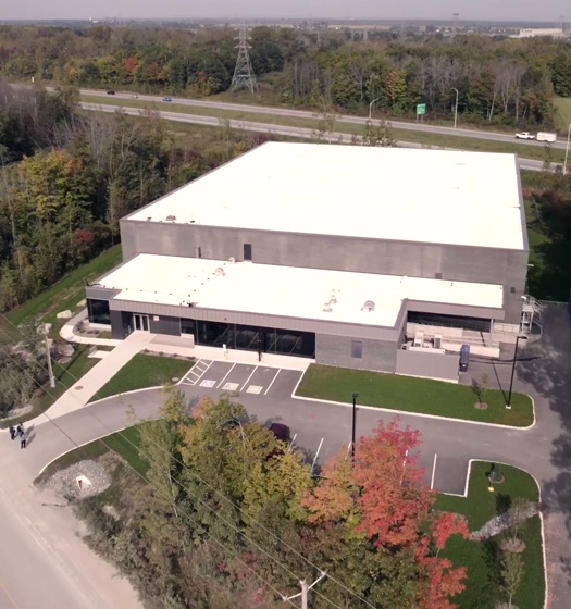 A building with trees and roads