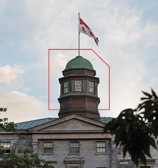 A flag on top of a building