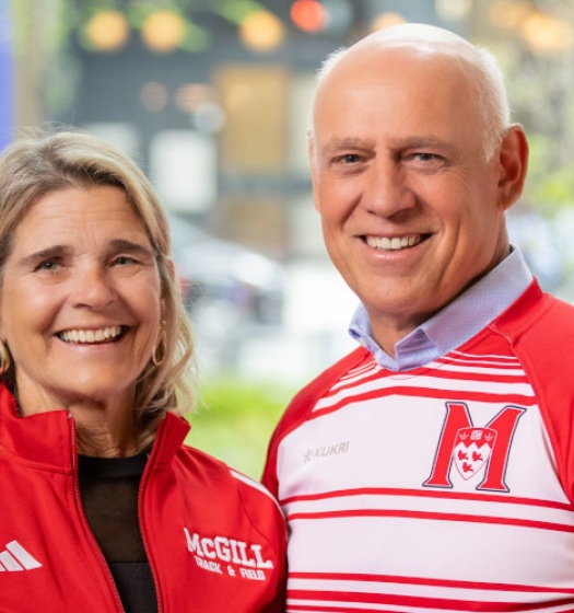 Woman and man wearing McGill colours